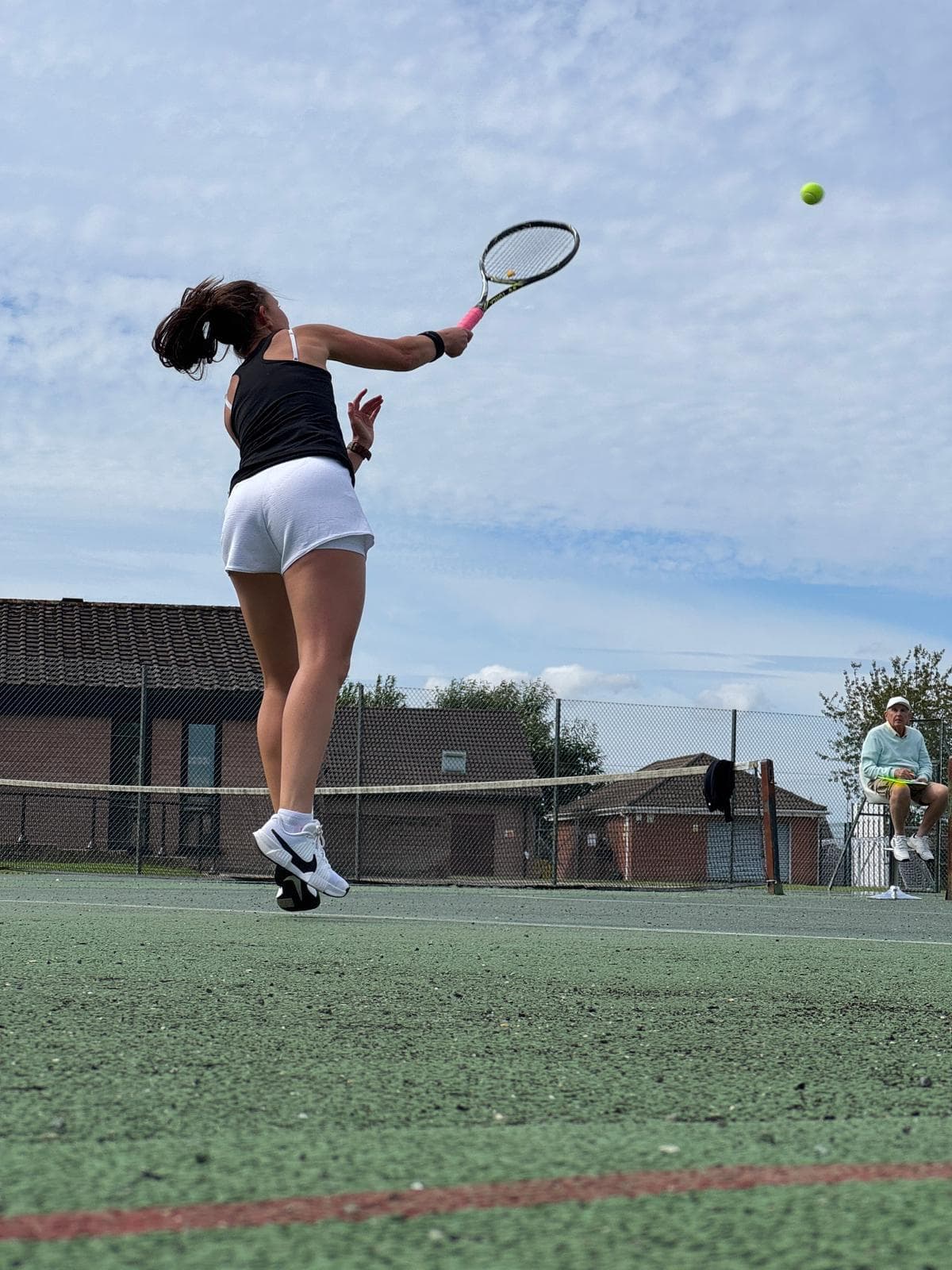 Tennis player preparing to strike a ball